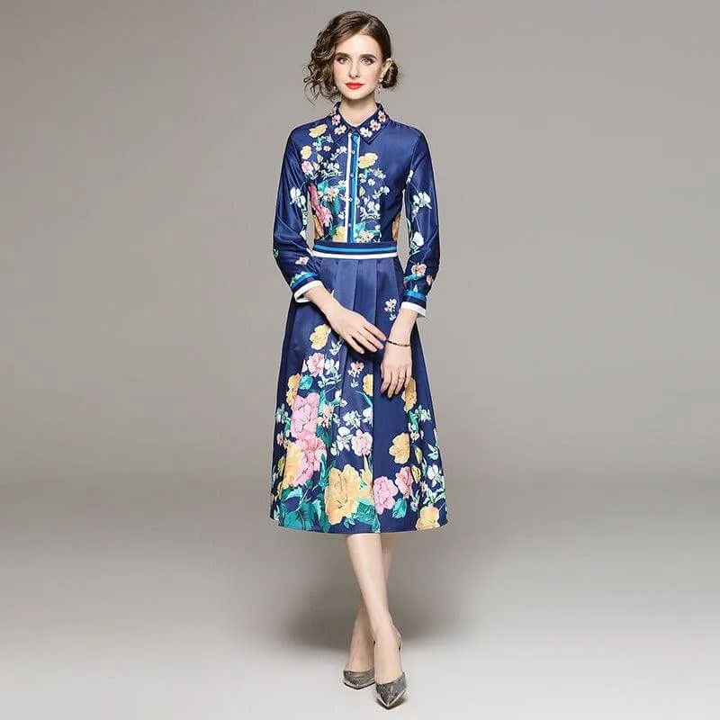 Elegant Blue Mid-Length Slimming Dress with Positioning Print