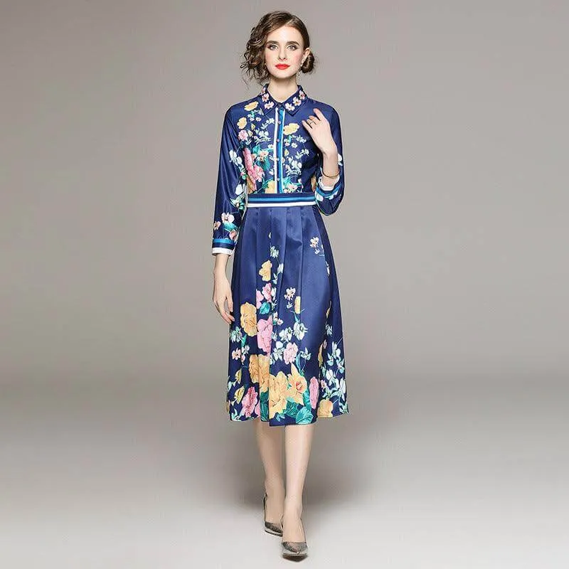 Elegant Blue Mid-Length Slimming Dress with Positioning Print