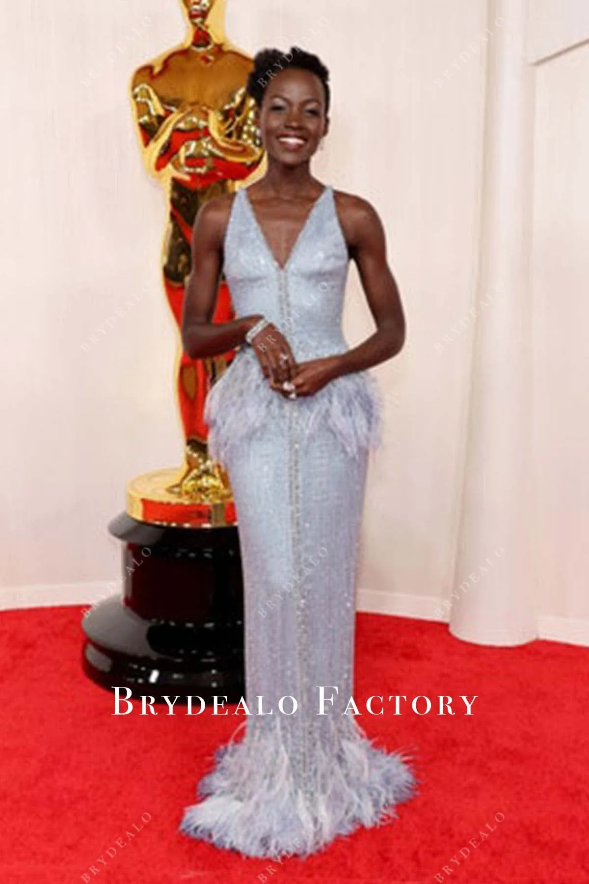 Lupita Nyong’o 2024 Oscars Sequin Feather Red Carpet Dress