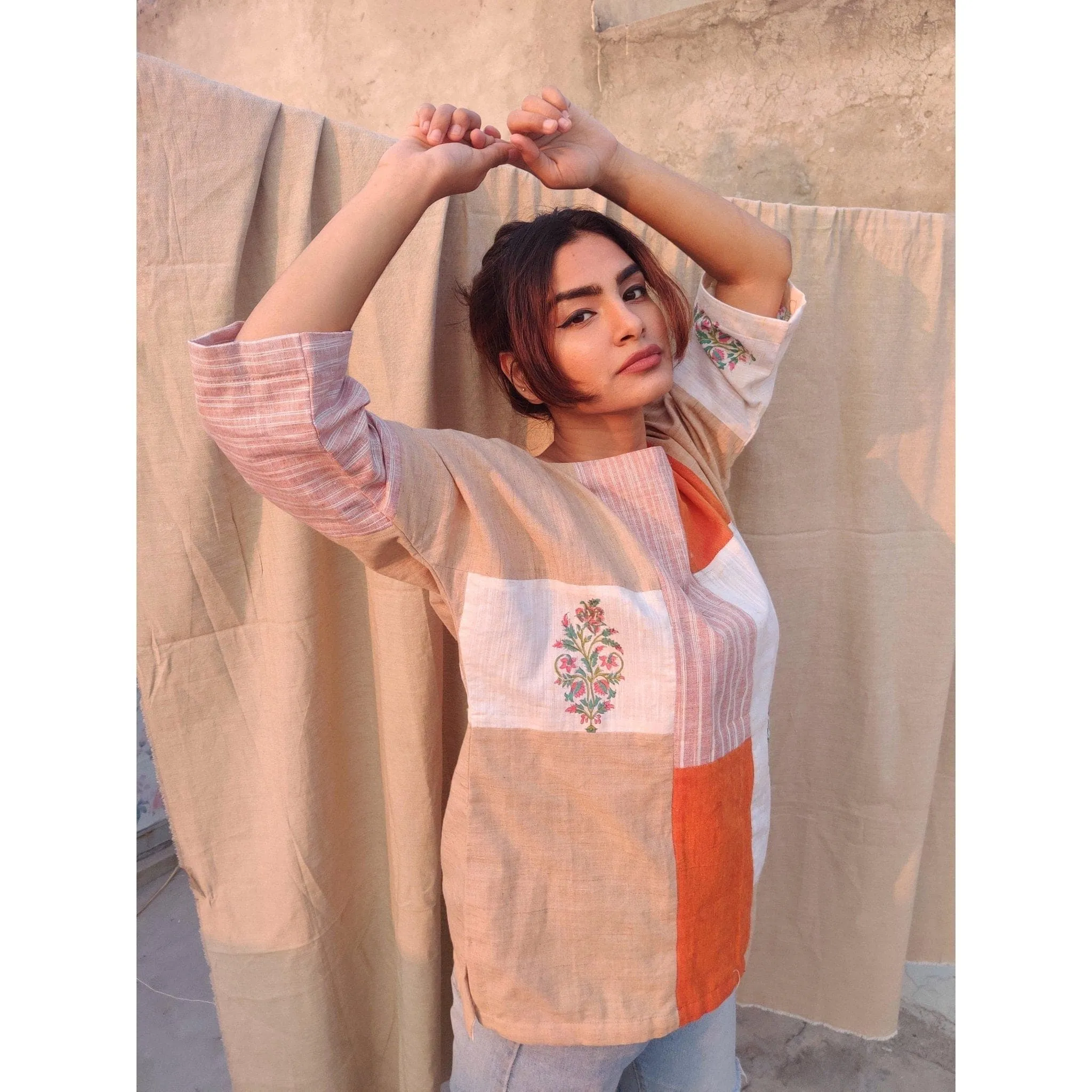 Orange "Puzzled" Neck Cotton Top