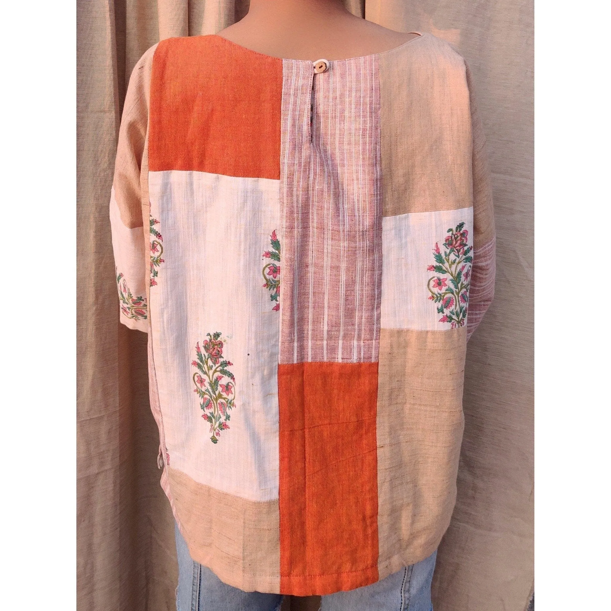 Orange "Puzzled" Neck Cotton Top