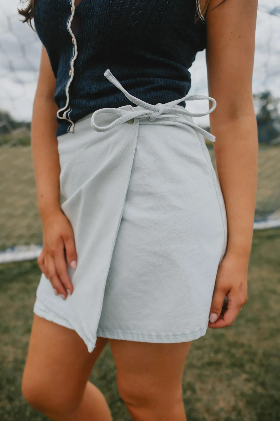 The Cassandra Mini Wrap Skirt by FRNCH